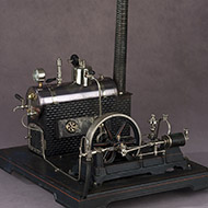 Doll steam engine model, 1925